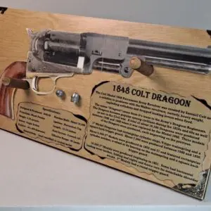 Wooden plaque displaying 1848 Colt Dragoon revolver