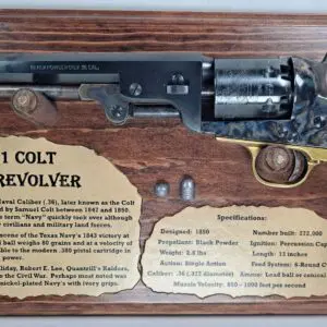 Antique percussion handgun with label and lead balls