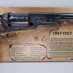 Blued antique sidearm on oak placard